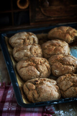 Homemade rye flatbreads on a baking sheet