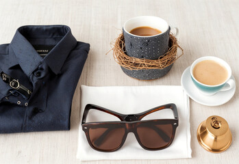 gift set with coffee, glasses, and tie, on  white background