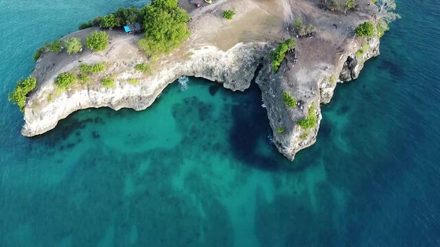 view of the edge of the cliff and the sea from the Lamreh cliff, Aceh, a hill with beautiful views recorded using a drone