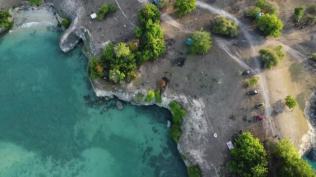 view of the edge of the cliff and the sea from the Lamreh cliff, Aceh, a hill with beautiful views recorded using a drone