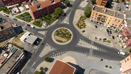 Aerial view of a roundabout in a small town.