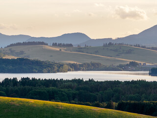 Mountain landscape. The setting sun illuminates the slopes of the hills.