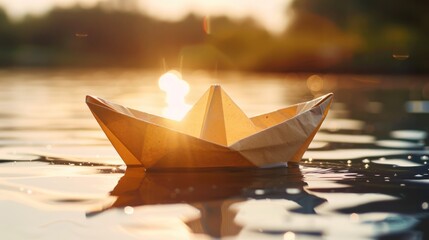 A paper boat gently floating on a still body of water, its edges reflecting the sunlight.