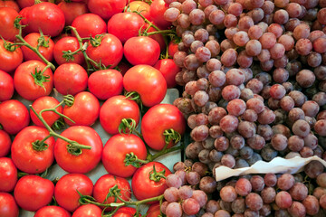 Fresh Tomatoes and Grapes at Mercat De La Boqueria in Barcelona