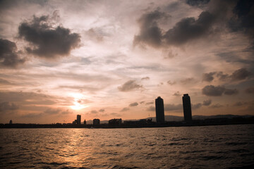 Barcelona Skyline at Sunset From the Sea With Prominent Buildings