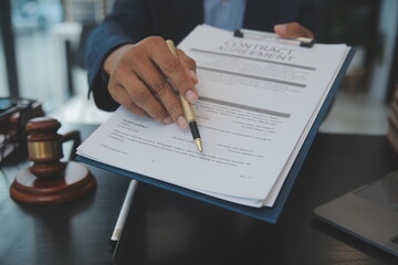 Law theme, gavel or mallet of the judge, lawyer enforcement officers, evidence-based cases taken into account in the court abount business, legislation.