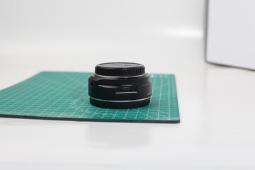 camera adapter for camera lens on white background
