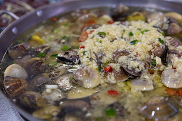 Bo Bo Clams/Pipis hotpot in Macau, with a flavorful mix of clams, pipis, fresh vegetables, and...
