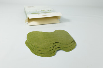 Medicinal plants knee patches on a white
