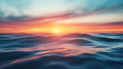 Obraz premium A serene sunset over tranquil ocean waves, blending vibrant hues of orange and blue.