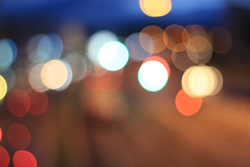 City Lights Bokeh: A mesmerizing blur of vibrant city lights at night, creating an abstract and...
