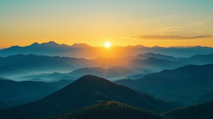 Serene mountain landscape at sunrise, showcasing layers of hills illuminated by warm golden light. A peaceful nature scene.