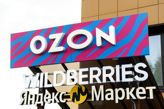 KIROV, RUSSIA - SEPTEMBER 18, 2024 OZON Wildberries and Yandex Market logo, signboard with three logos, top and main russian marketplaces, attached to building