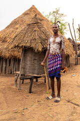 Ethiopia, man from the Karo tribe with typical head decoration and face paintings in his village in the Omo Valley. 21 th of february 2024