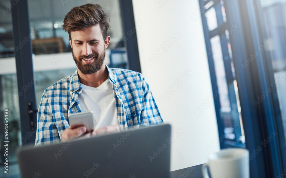 Poster Happy man, thinking and typing on cellphone for networking, communication or message in office. Designer, planning and creative idea on smartphone with social media and connection for email startup