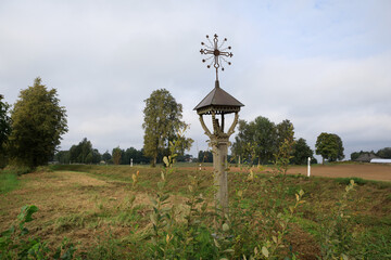 Wooden column shrine in Lithuania