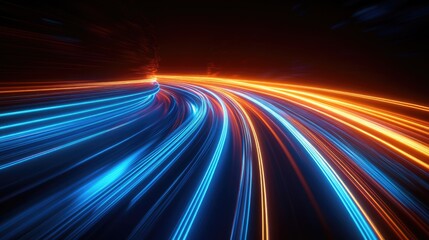 Abstract light trails of a speeding car on a dark road.