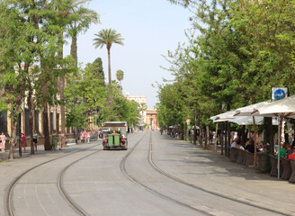 Street cleaning vehicle working on empty tram tracks