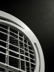 White ventilation grill on a black background.