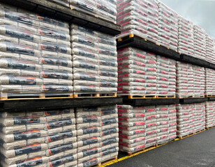 Warehouse with packed wooden pellets on pallets ready for shipment