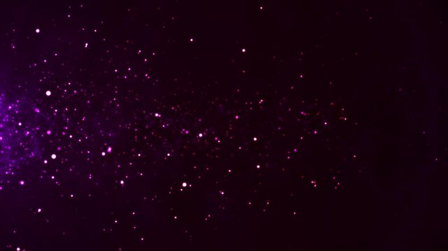 Abstract particle animation on black background