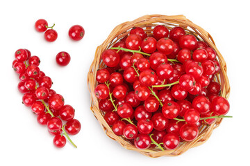 Red currant berries in a wicker basket with leaf isolated on white background. Top view. Flat lay