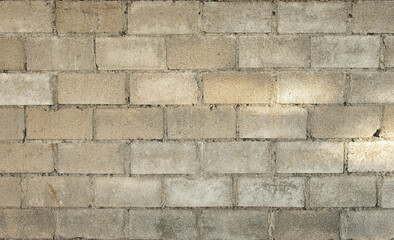 A brick wall with a spotlight on it