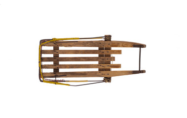 vintage wooden sleigh isolated on white background