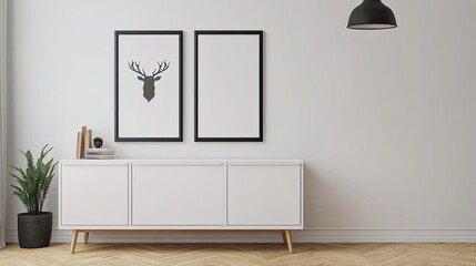This stylish Scandinavian living room features a white sideboard, black frames, and a deer head poster, accented by plants and a black hanging lamp in warm tones.