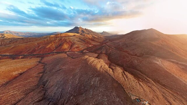 360 degrees seamless loopable aerial panorama of desert landscape near Mirador Sicasumbre and Montana Cardon at sunset, Fuerteventura island, Spain.
