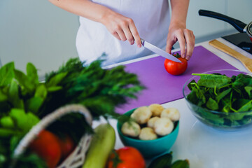 Close up photo of chef preparing tasty dish modern kitchen home house day light indoors