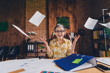 Photo of positive happy successful woman sitting armchair working as administrator modern loft...