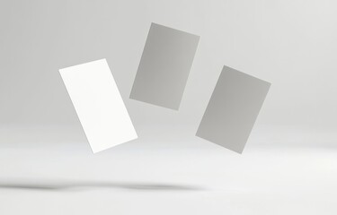 three Blank Business Cards Floating in the Air on a White Background, Mockup Style