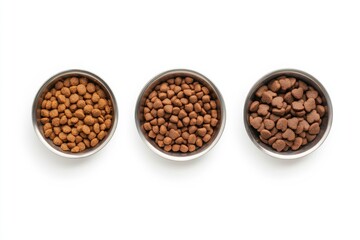 Three dishes of dry pet food in metal bowl.