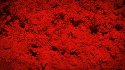 A bold textured background with intense red hues, resembling a rough stone surface. Perfect for striking designs, banners, and digital artwork