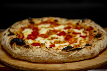 Traditional Brazilian artisan chicken pizza with catupiry cheese. Frango com catupiry