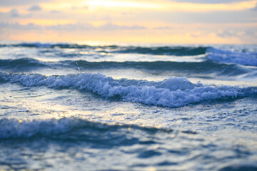 Waves splashing background. Ocean waves background. Ocean or sea waves. Sky and clouds background.