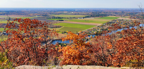 Magnificent sweeping views from the highest point on the King mountain and Eardley escarpment with a view of the spectacular autumn fall colours in red,orange and yellow at Gatineau Park,Quebec,Canada