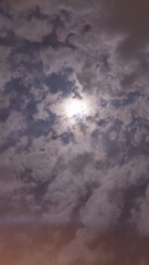 textured cloud photo at night with moonlight as highlights 