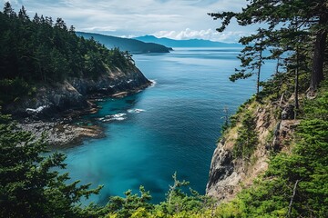 Fototapeta premium Aerial view of a picturesque ocean inlet surrounded by lush green forest and mountains