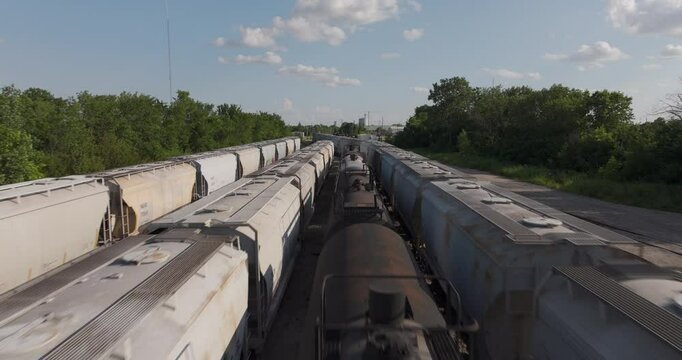 Freight train cars in kansas yard above engine locomotive