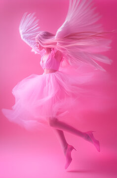 A pink angel with long, flowing hair, wearing a pink gown and shoes, spins in the air with a dynamic, blurry movement.