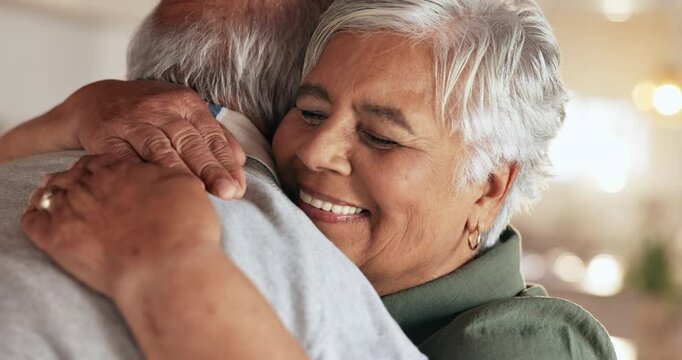 Senior, couple and hugging with love in home for romance, loyalty and commitment in marriage with smile. Elderly, people and affection with bonding, trust and embrace in retirement in lounge of house