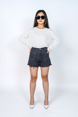 Asian Woman in Blank White Long Sleeve Shirt Striking a Confident Pose