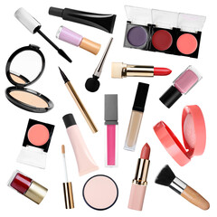 Different makeup products in air on white background