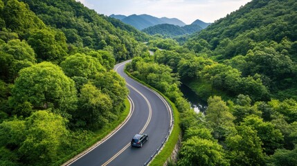 Scenic Road Through Lush Green Mountain Landscape