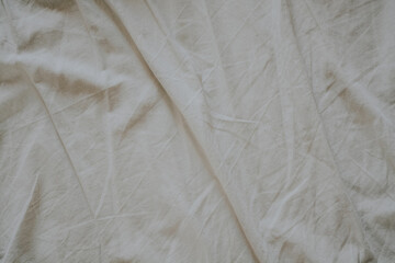 crumpled beige cotton fabric for background