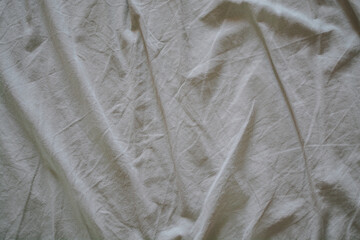 crumpled beige cotton fabric for background