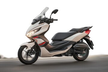 White and black motorcycle with black seat and handlebars parked on gray road. Motorcycle faces right side of frame with blurred background suggesting motion.