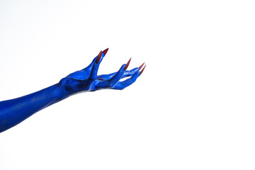 A witch's blue hand with sharp red nails on a white background. It exudes a demonic, monstrous vibe, blending vampire, alien, and ghostly features, creating a perfect Halloween horror image.